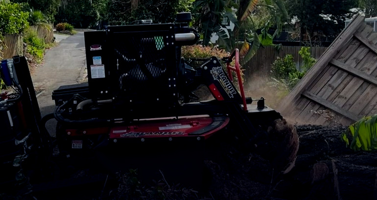 Stump grinder removing a stump after a tree removal